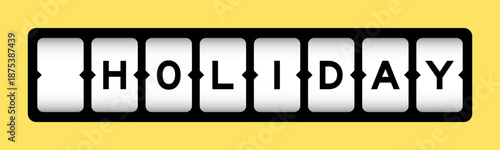 Black color in word holiday on slot banner with yellow color background