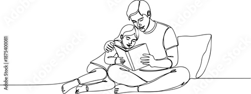 Father reading a book with his son