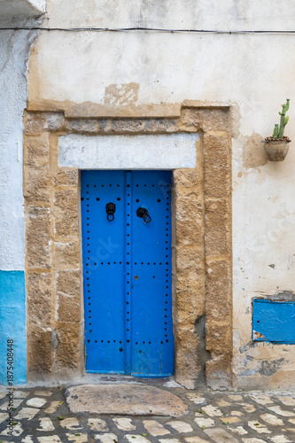 Traditional blue gate in Bizerte medina, Tunisia