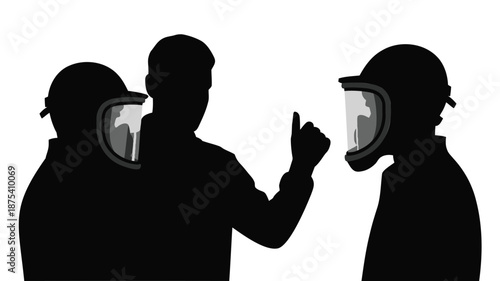 Silhouettes of workers wearing helmets and face shields communicating