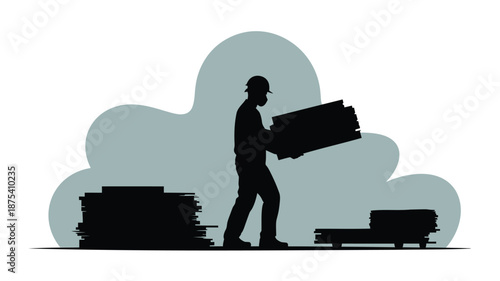 Worker in silhouette carrying heavy load at industrial site with stacks of materials