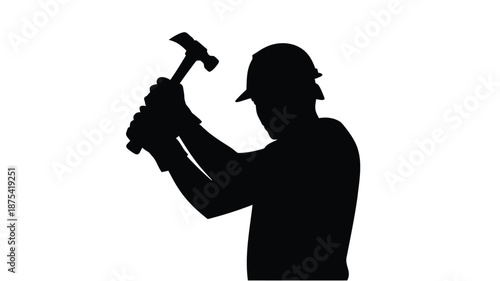 Silhouette of worker in hard hat holding hammer