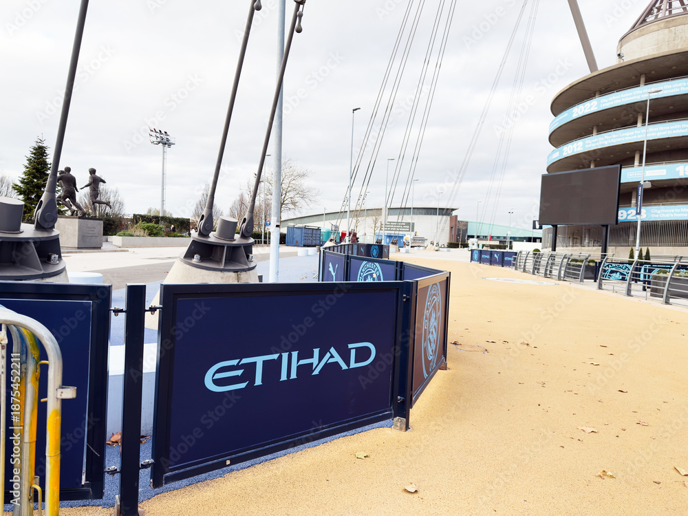 Fototapeta premium Etihad Stadium exterior barriers and cables at City of Manchester Stadium in Manchester UK