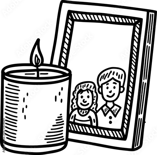 Memorial candle beside framed of couple remembering loved ones with light and memories