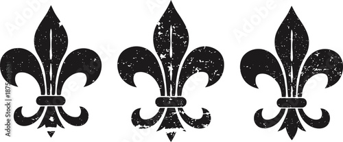 Three vintage fleur de lis symbols with textured distressed black design on white background