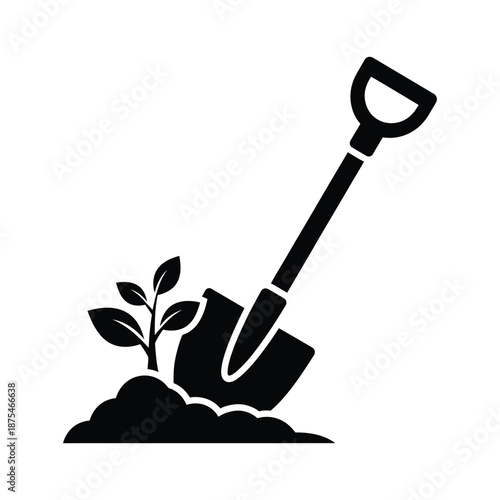 Shovel digging soil next to small plant for gardening and agriculture concept
