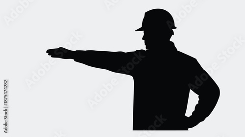 Confident construction worker pointing in modern silhouette style