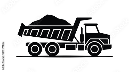 Black silhouette of a dump truck carrying a load