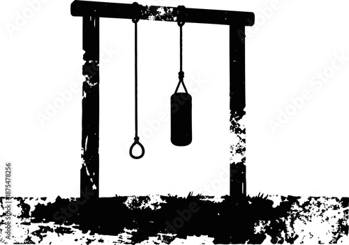 Gymnastic rings and punching bag hanging from wooden frame with grunge texture