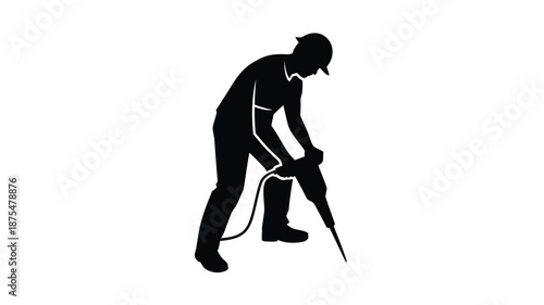 Man using jackhammer for construction work