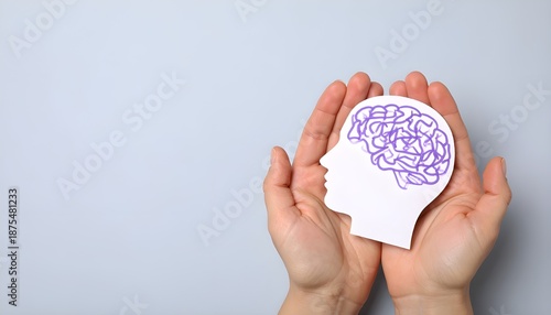 Illustration of the human brain with epilepsy in caring hands on a light blue background