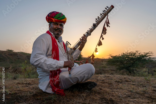 Rajasthani folklore musician playing  Ravanahatha instrument in Pushkar Rajasthan India