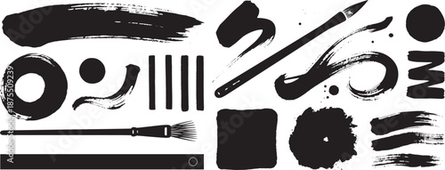 Black ink brush strokes and splatters with abstract calligraphy and artistic marks