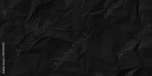 Crumpled black paper billboard closeup ripped wrinkle litter canvas page vintage texture background.