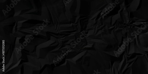 Crumpled black paper billboard closeup ripped wrinkle litter canvas page vintage texture background.