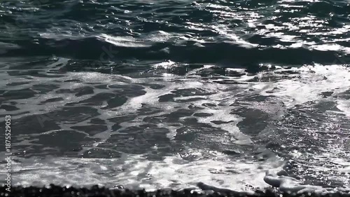 Wallpaper Mural Gentle waves washing rocky shoreline Bogliasco Italy blue water Torontodigital.ca