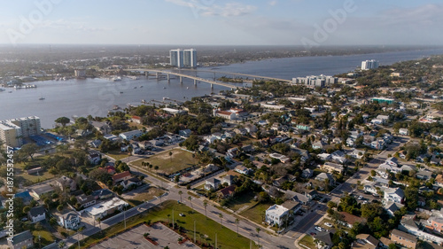Foto Aerial view of Daytona Beach city with river coastline and neighborhoods