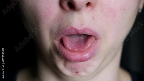 Caucasian woman, face disgust with negative emotion, nasty odor or gross smell. Person feel nauseous. Annoyed body expression and yuck reaction. Sticks tongue out of mouth. High quality 4k footage.