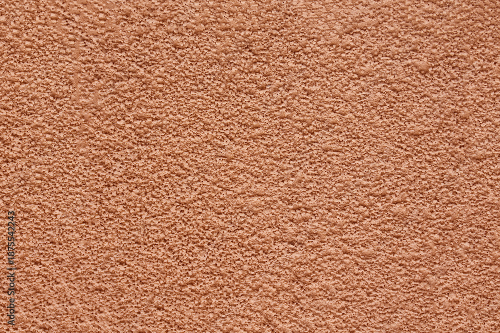 Fototapeta premium rough pink plaster stucco wall texture pattern, cement plaster Texture of pink wall as a background backdrop