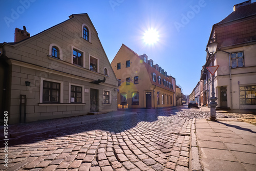 Cobbled pavements of old town streets in Klaipeda, Lithuania on sunny