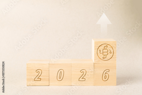 Wooden blocks showing year 2026 with a Bitcoin icon and upward arrow, representing cryptocurrency market growth, financial trends, investment success, and digital asset bullish forecast in 2026.