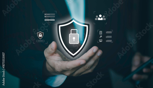 Cybersecurity and data protection. Concept of personal information security, privacy policy, firewall, and secure login for corporate network. Professional holding shield icon with padlock on mobile