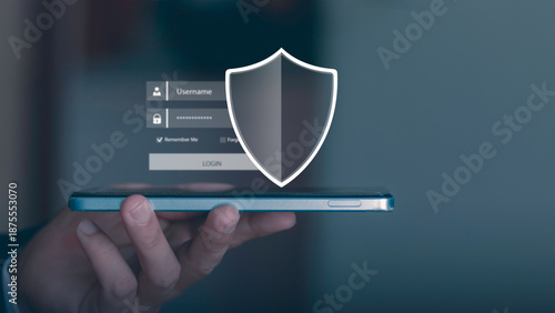 Cybersecurity and data protection. Concept of personal information security, privacy policy, firewall, and secure login for corporate network. Professional holding shield icon with padlock on mobile