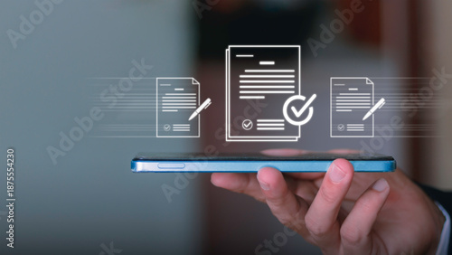 E-signature, online agreement, contract, secure document management and paperless business. Digital contract approval concept with documents and checkmark icons above a smartphone.