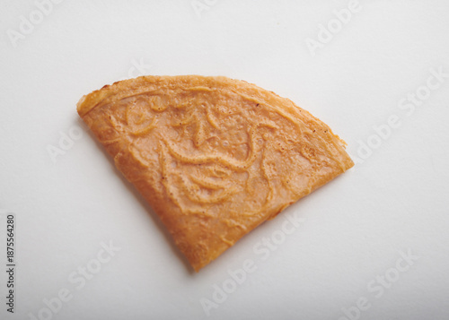 Single Kuih Kapit Cookie Isolated on White Background