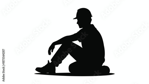 Man sitting in contemplative pose in black silhouette