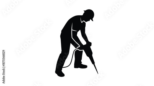 Man using jackhammer for construction work