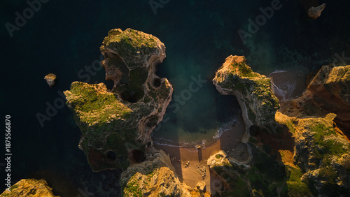 Bild auf Leinwand Top Down Aerial of Coastal Rock Formations in Lagos, Algarve, Portugal