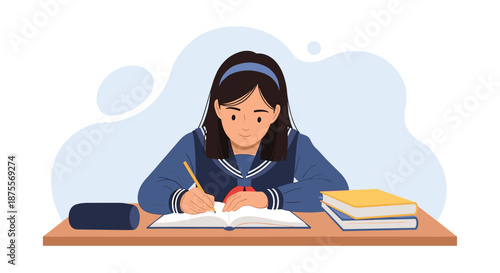 Diligent Japanese schoolgirl in a sailor uniform sitting at her desk and focused on studying while writing in her notebook.
