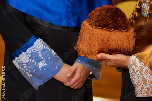 Academic ceremony with a doctor's birrete hat