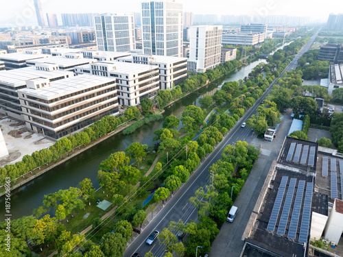 road through modern city with tree around © zhu difeng