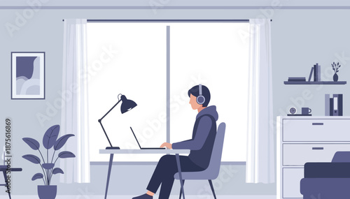 Man working remotely at desk with laptop and headphones in home office by large window natural light plant