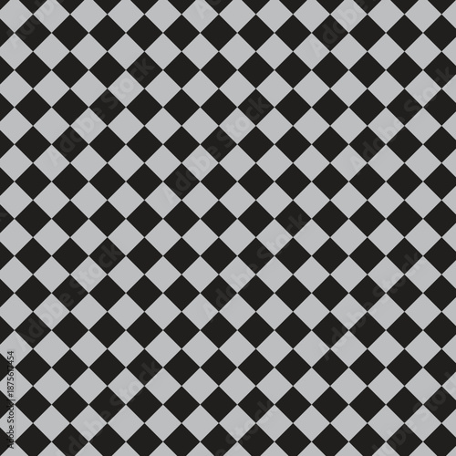 Seamless pattern of alternating black and grey diamonds arranged in a checkerboard style, creating a geometric and repetitive background.