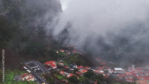 Misty mountain village, Fog surrounds winding mountain paths