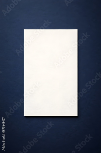 Blank vertical textured white paper card mockup on a deep navy blue background with copy space for design, business, or presentation.