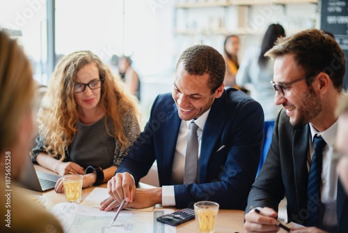 Εκτύπωση καμβά A diverse group of professionals, including a Black man in a suit collaborate in a meeting, discussing strategies and sharing ideas