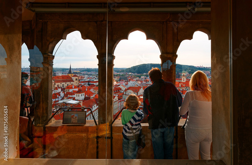 Wallpaper Mural A little boy with his parents gazing through the windows atop the medieval Astronomical Clock Tower and enjoying a beautiful panoramic view over the Old Town Square of Prague in Czech Republic, Europe Torontodigital.ca