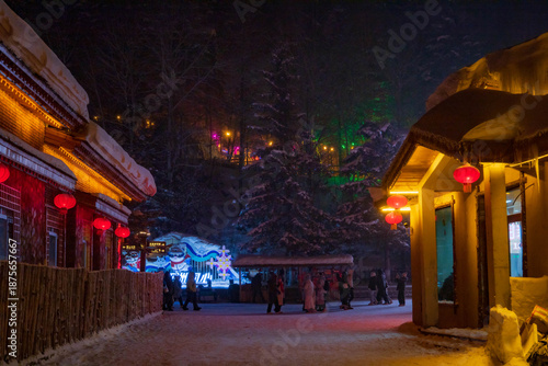 Snowy winter festival night market at  Xuexiang China snow town.