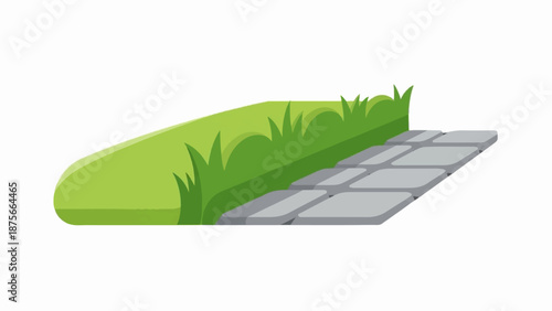 Green grass meets a path made of grey stones