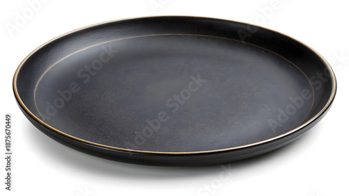 Elegant black plate with gold rim on white background