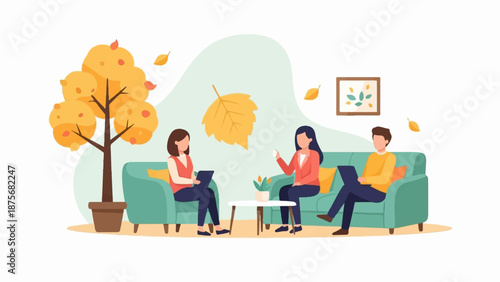 People relax on a couch with a potted autumn tree indoors