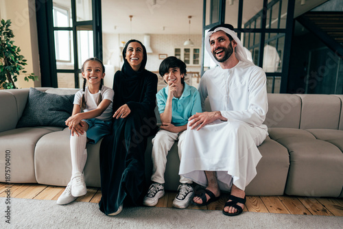 Bild auf Leinwand Traditional arabian family from Dubai spending time together at home