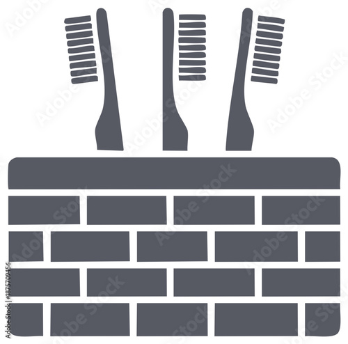 Three dental toothbrushes in a stylish brick texture holder promoting oral hygiene