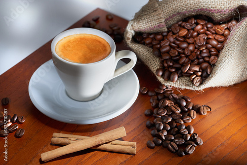 Espresso coffee cup with fresh roasted beans