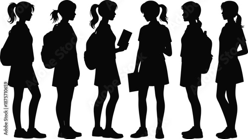 School girls silhouette set with backpacks, standing student poses, education concept black vector illustration isolated on white background