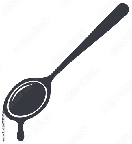 A Dark Silhouette of a Spoon with a Droplet of Liquid Dripping Off
